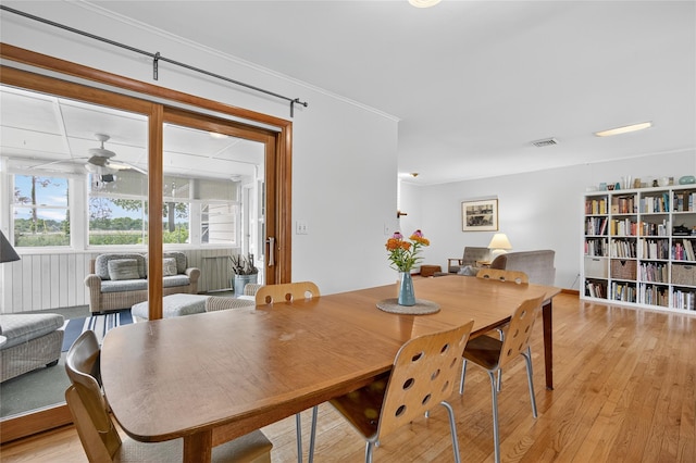 7641 N Broadway, Red Hook, NY 12571 - dining space featuring light wood-type flooring and a ceiling fan