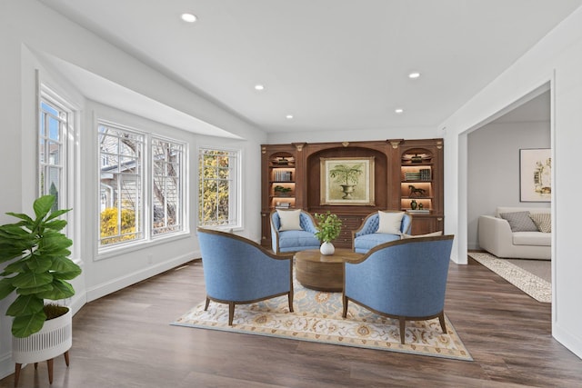 12 Foxhurst Ct, Manhasset Hills, NY 11040 - living area featuring healthy amount of natural light, recessed lighting, and wood finished floors