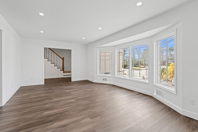 12 Foxhurst Ct, Manhasset Hills, NY 11040 - unfurnished room with recessed lighting, dark wood-style floors, and stairway
