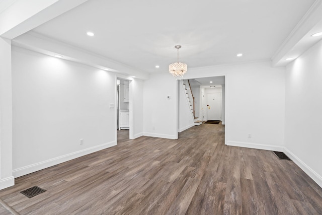 12 Foxhurst Ct, Manhasset Hills, NY 11040 - spare room with recessed lighting, stairs, and wood finished floors