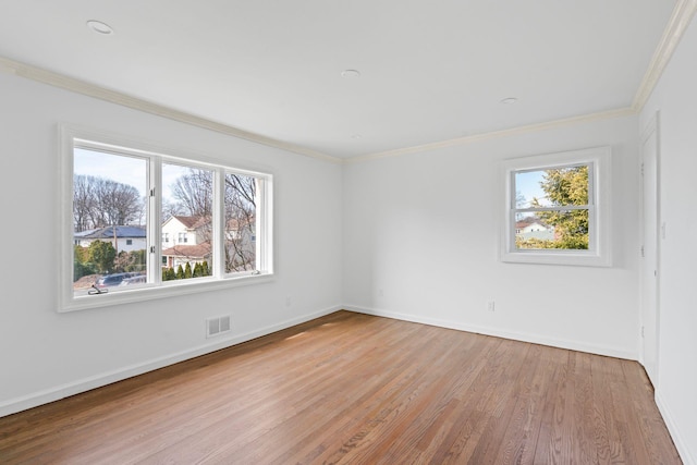 12 Foxhurst Ct, Manhasset Hills, NY 11040 - spare room with crown molding and wood finished floors