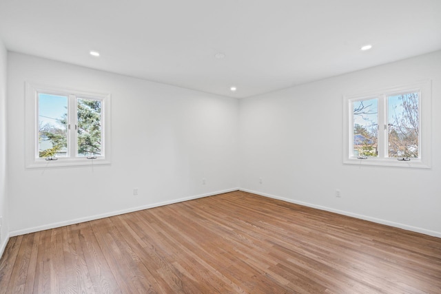 12 Foxhurst Ct, Manhasset Hills, NY 11040 - empty room featuring light wood-style flooring and recessed lighting
