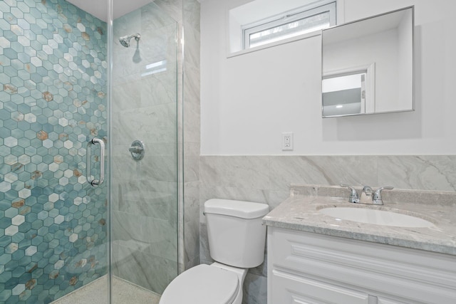 12 Foxhurst Ct, Manhasset Hills, NY 11040 - full bathroom featuring vanity, a shower stall, and tile walls