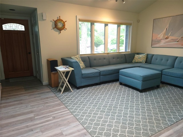 67 Wakeman Rd, Hampton Bays, NY 11946 - living area featuring wood finished floors and lofted ceiling