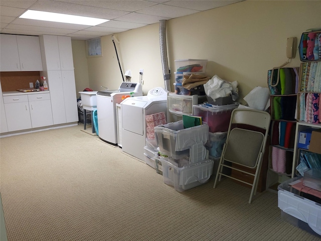 67 Wakeman Rd, Hampton Bays, NY 11946 - washroom featuring washing machine and clothes dryer and light colored carpet