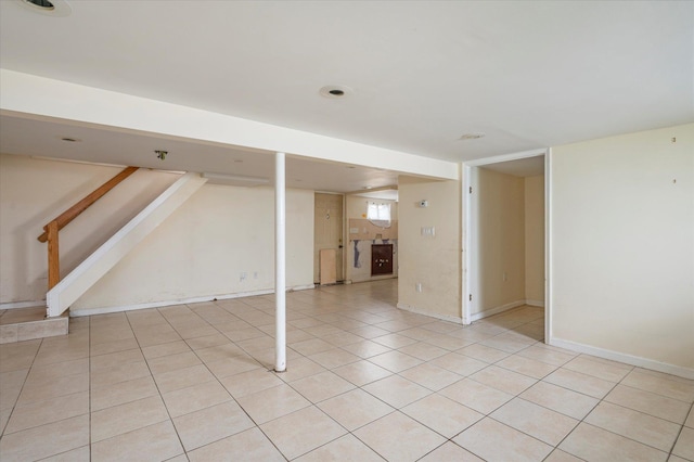 21 Silver St, West Babylon, NY 11704 - finished below grade area featuring light tile patterned floors and stairs