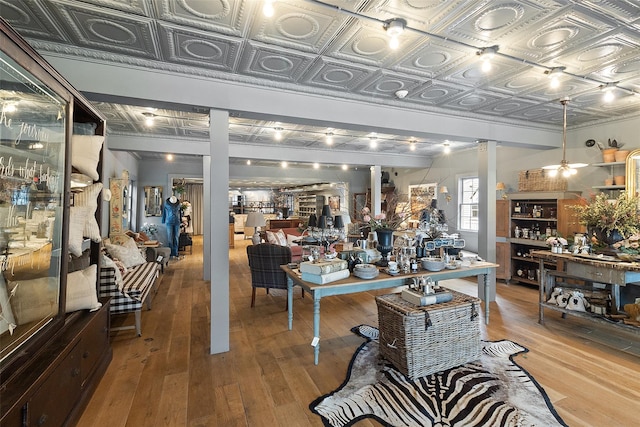 259 Westchester Ave, Pound Ridge, NY 10576 - living area with an ornate ceiling, light wood-style flooring, and ornate columns