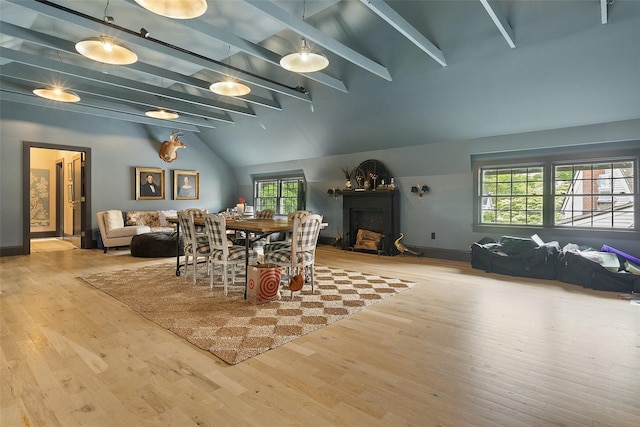 259 Westchester Ave, Pound Ridge, NY 10576 - dining area featuring wood finished floors and a fireplace
