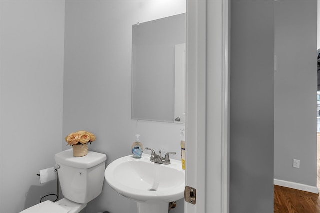 28 Pinto Rd W, Middletown, NY 10941 - half bath featuring a sink and wood finished floors