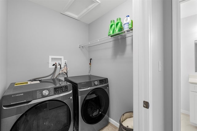 28 Pinto Rd W, Middletown, NY 10941 - washroom featuring attic access and washer and clothes dryer