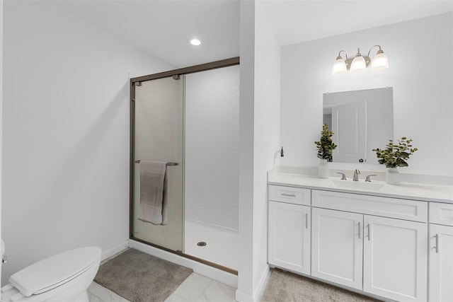 28 Pinto Rd W, Middletown, NY 10941 - bathroom featuring vanity, a shower stall, marble look tiles, and recessed lighting