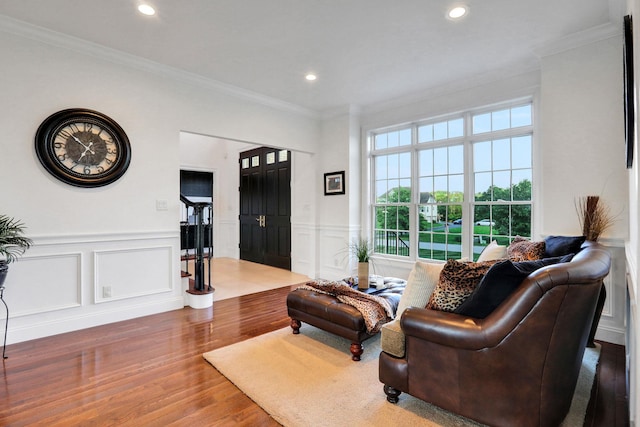 28 Viola Ct, Wappingers Falls, NY 12590 - living room with wood finished floors, ornamental molding, a decorative wall, and recessed lighting