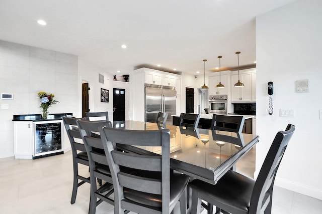 28 Viola Ct, Wappingers Falls, NY 12590 - dining space featuring beverage cooler and recessed lighting