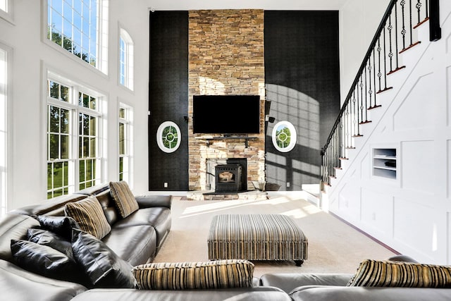 28 Viola Ct, Wappingers Falls, NY 12590 - carpeted living area with a towering ceiling and stairway