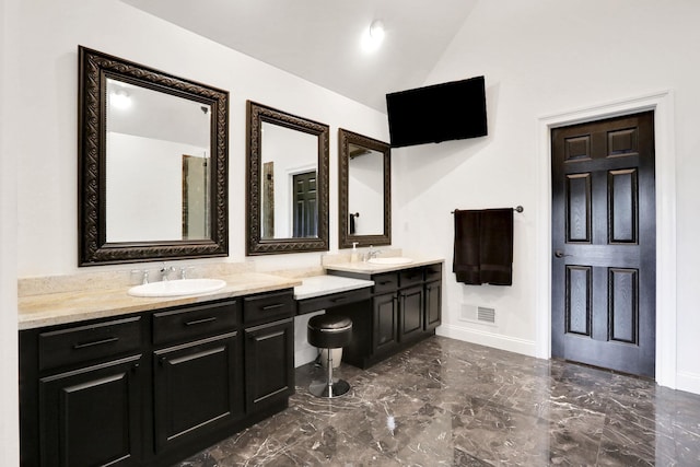 28 Viola Ct, Wappingers Falls, NY 12590 - full bath with marble tiled flooring, vanity, and vaulted ceiling