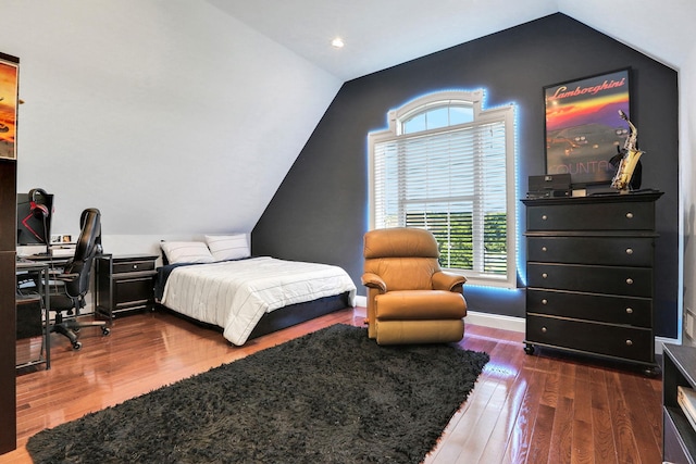 28 Viola Ct, Wappingers Falls, NY 12590 - bedroom with vaulted ceiling, multiple windows, wood finished floors, and a desk