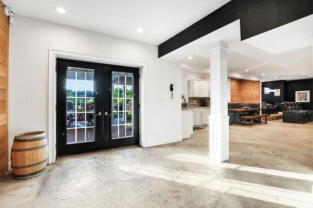 28 Viola Ct, Wappingers Falls, NY 12590 - entrance to property featuring french doors, a surveillance system, a patio, and exterior kitchen