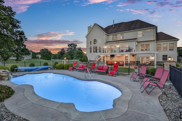 28 Viola Ct, Wappingers Falls, NY 12590 - pool at dusk featuring a patio area, a fenced backyard, and stairway