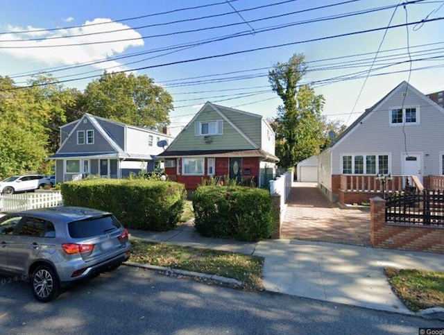 133-23 161st St, Rochdale, NY 11434 - bungalow with an outbuilding and a detached garage