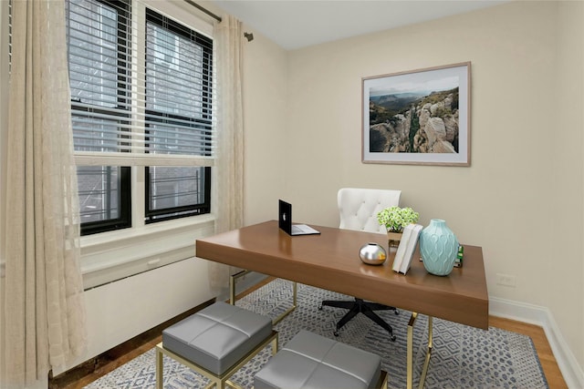 445 W 240th St Unit 4C, Bronx, NY 10463 - office area featuring wood finished floors and baseboards