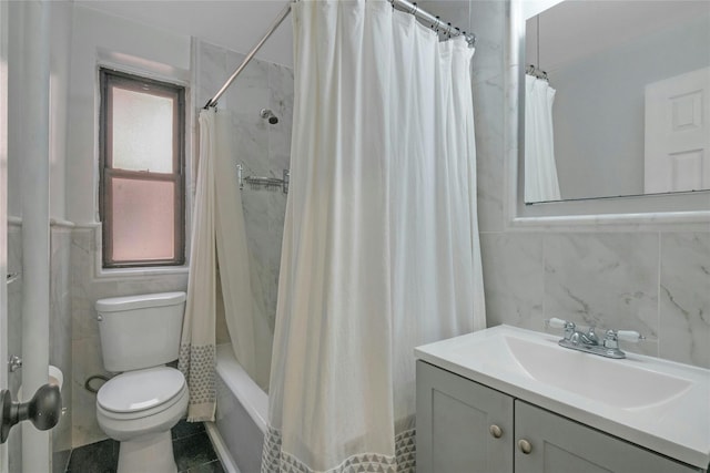 445 W 240th St Unit 4C, Bronx, NY 10463 - full bathroom featuring vanity, tile walls, and shower / tub combo with curtain