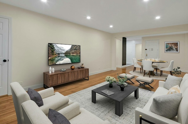 445 W 240th St Unit 4C, Bronx, NY 10463 - living room with light wood-style floors and recessed lighting