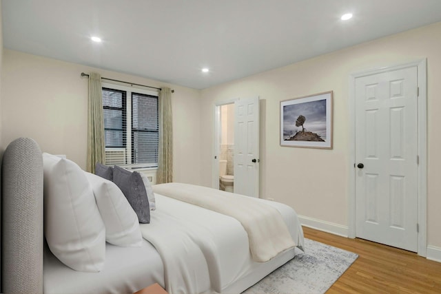 445 W 240th St Unit 4C, Bronx, NY 10463 - bedroom with light wood-style flooring, recessed lighting, and connected bathroom