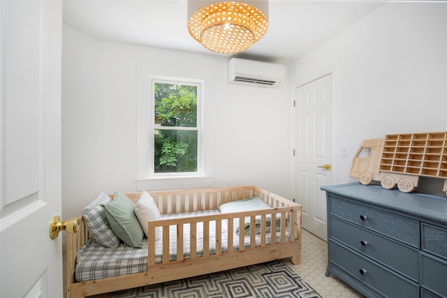 22 Tompkins Ave, Beacon, NY 12508 - bedroom with a wall unit AC and light flooring