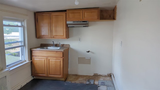 507 S 6th Ave, Mount Vernon, NY 10550 - kitchen with under cabinet range hood and brown cabinetry