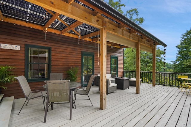 10 King St, Croton-On-Hudson, NY 10520 - wooden deck with a fire pit and outdoor dining area