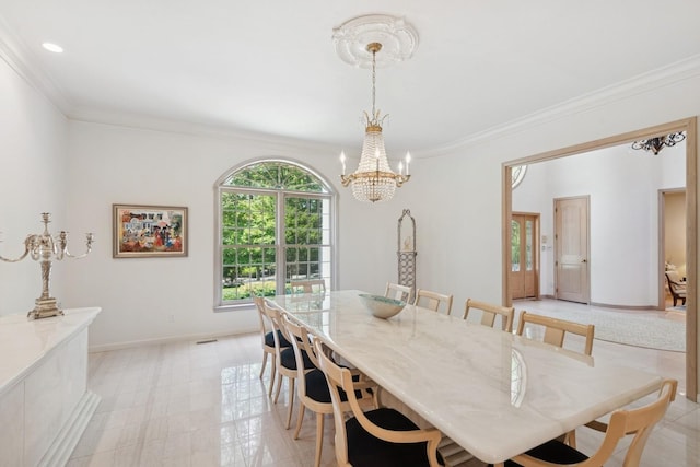 9 Swan Pl, Nissequogue, NY 11780 - dining space featuring crown molding and a chandelier
