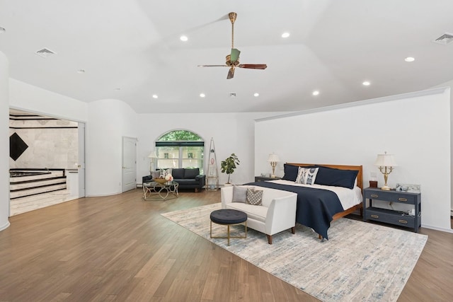 9 Swan Pl, Nissequogue, NY 11780 - bedroom featuring vaulted ceiling, wood finished floors, recessed lighting, and a ceiling fan