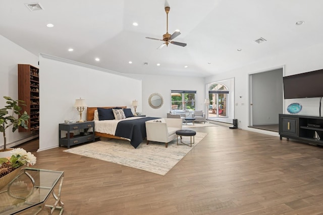 9 Swan Pl, Nissequogue, NY 11780 - bedroom with wood finished floors, recessed lighting, and baseboard heating