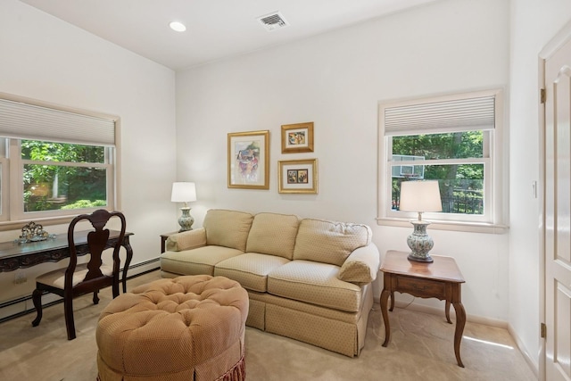 9 Swan Pl, Nissequogue, NY 11780 - living room with light carpet, a desk, a baseboard radiator, and recessed lighting