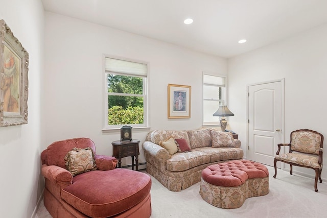 9 Swan Pl, Nissequogue, NY 11780 - living room featuring light colored carpet, a baseboard radiator, and recessed lighting