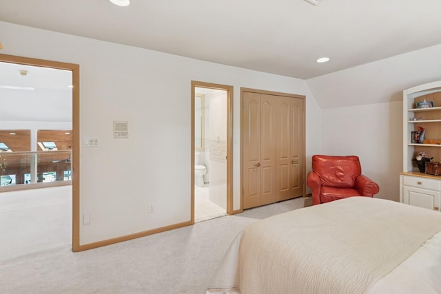 9 Swan Pl, Nissequogue, NY 11780 - bedroom featuring light carpet, ensuite bath, recessed lighting, and lofted ceiling
