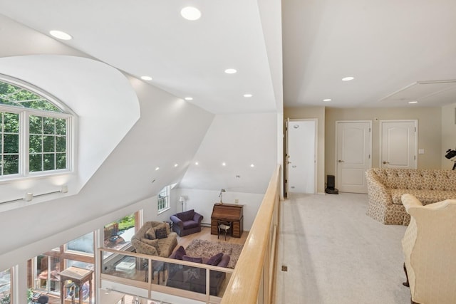 9 Swan Pl, Nissequogue, NY 11780 - living area with light colored carpet, recessed lighting, attic access, and lofted ceiling