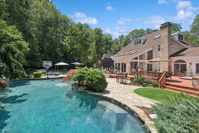 9 Swan Pl, Nissequogue, NY 11780 - outdoor pool with a wooden deck and a patio
