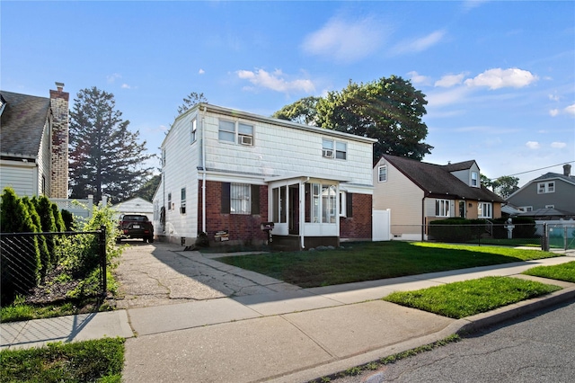 550 Armond St, Uniondale, NY 11553 - view of front of home featuring brick siding, a garage, and a residential view