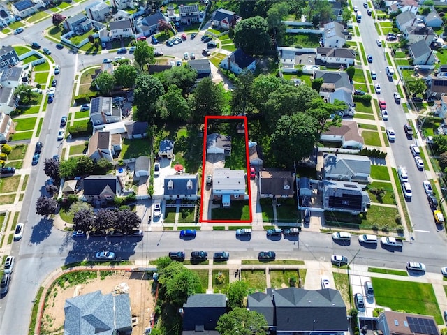 550 Armond St, Uniondale, NY 11553 - aerial view of property and surrounding area with nearby suburban area and property boundaries highlighted