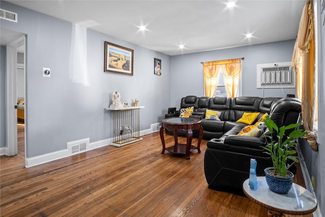 550 Armond St, Uniondale, NY 11553 - living room with hardwood / wood-style flooring and recessed lighting