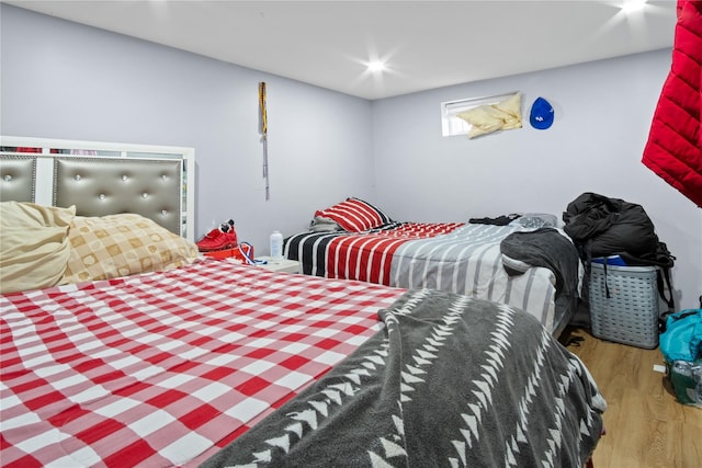 550 Armond St, Uniondale, NY 11553 - bedroom with wood finished floors and recessed lighting