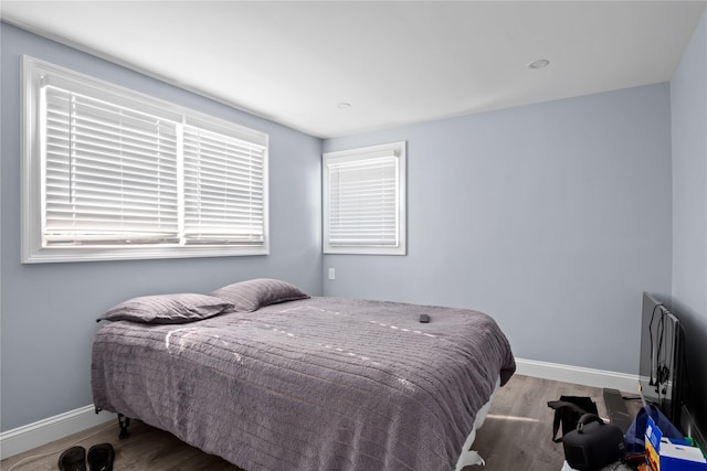550 Armond St, Uniondale, NY 11553 - bedroom with wood finished floors and baseboards