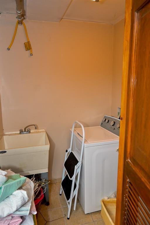 3331 Hone Ave, Bronx, NY 10469 - washroom with washer / clothes dryer and light tile patterned flooring