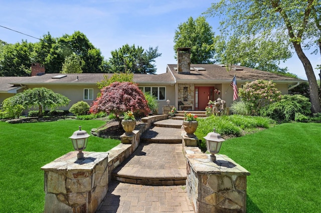 6 Cambridge Dr, Village Of The Branch, NY 11787 - ranch-style home featuring a chimney and a front yard