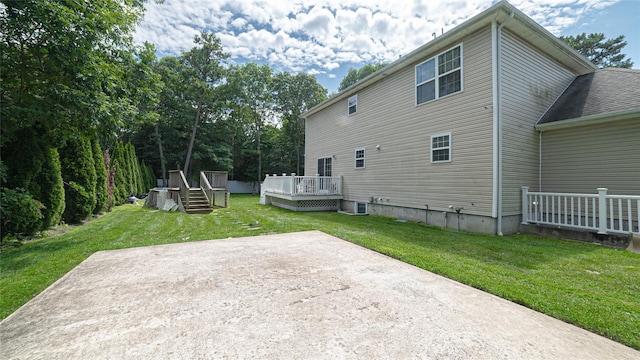 5 Ormond Pl, Mastic, NY 11950 - rear view of property with a patio area, a yard, and a wooden deck