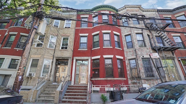 1050 Morris Ave, Bronx, NY 10456 - view of front facade with entry steps and brick siding