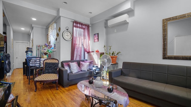 1050 Morris Ave, Bronx, NY 10456 - living area featuring a wall mounted AC, wood finished floors, and recessed lighting