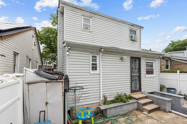 1160 E 89th St, Brooklyn, NY 11236 - rear view of property with entry steps