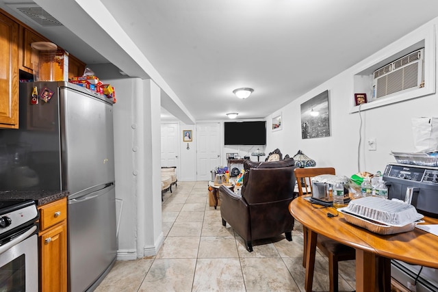 1160 E 89th St, Brooklyn, NY 11236 - living room featuring light tile patterned floors